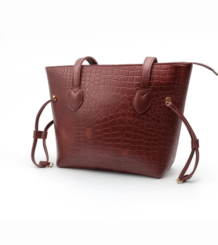 Burgundy Croc Textured Tote Bag at Nouvaid Center. Luxurious burgundy faux leather with embossed crocodile texture, spacious, and perfect for everyday use