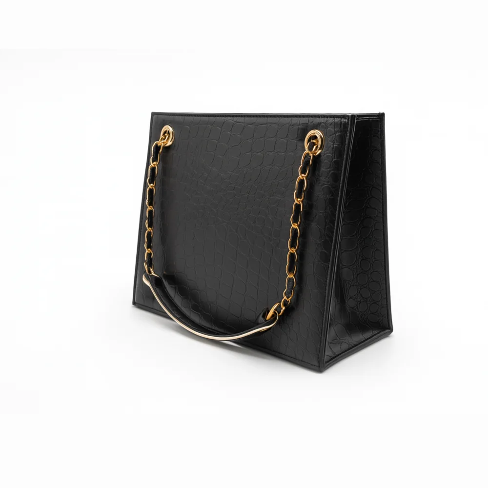 Black croc chain hand carry bag design in Pakistan by Nouvaid Center, luxurious and stylish leather hand bag for women.