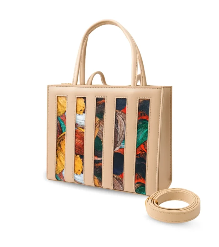 Artistic beige tote new handbag design by Nouvaid Center, vibrant leather hand bag for women.