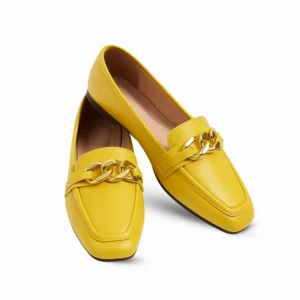Sleek women’s loafers in a bold yellow finish, accented with a polished gold chain detail across the vamp for a modern twist on a classic silhouette. Light weigaht and easy to slip on.