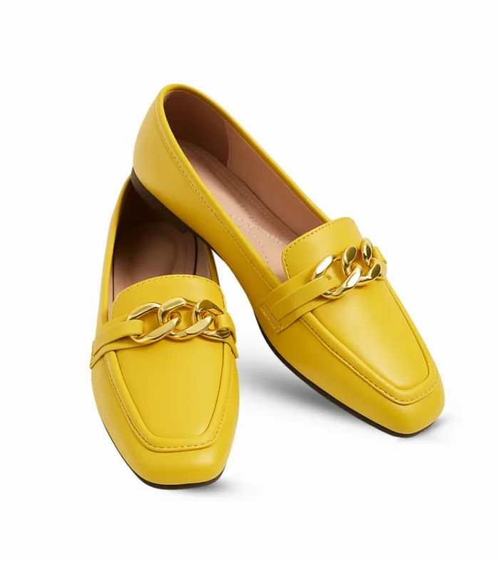 Sleek women’s loafers in a bold yellow finish, accented with a polished gold chain detail across the vamp for a modern twist on a classic silhouette. Light weigaht and easy to slip on.