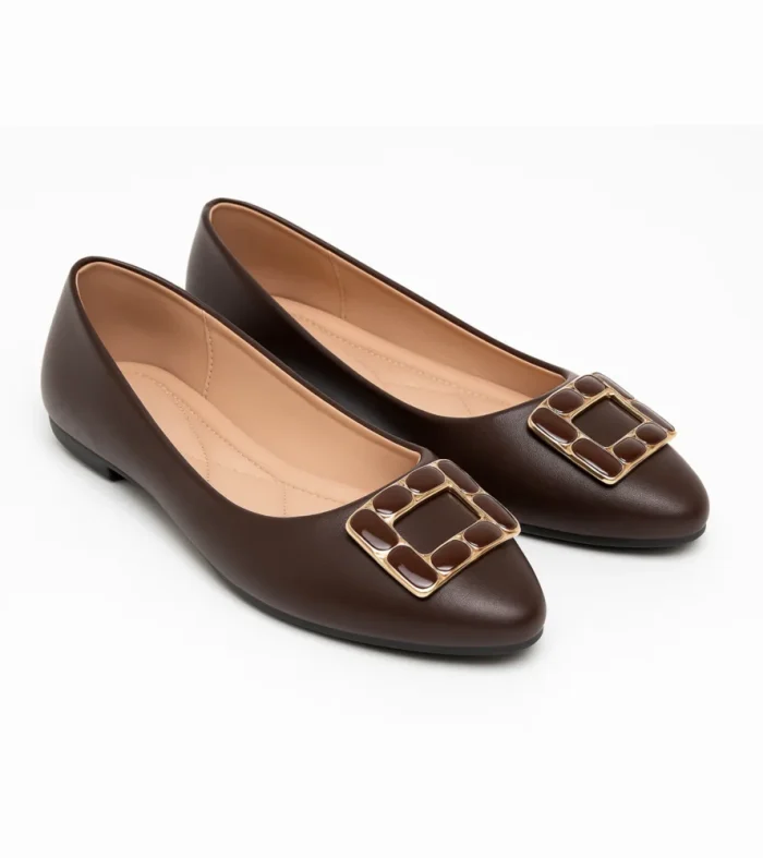 Sophisticated women’s flats in a rich mocha brown shade, featuring a bold square buckle detail with gold trim for a polished and timeless look. Designed for versatility and elegance.