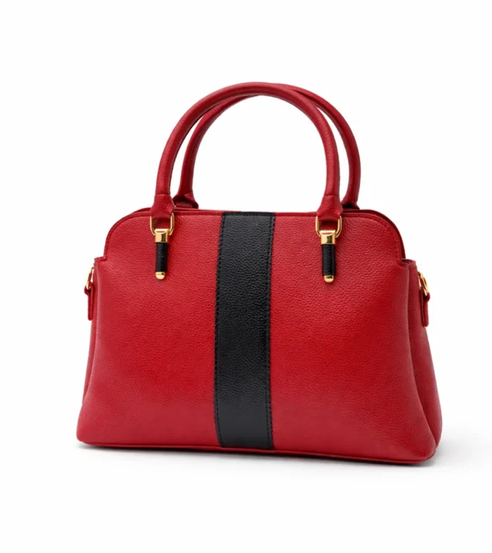 Front view of a structured red pebble-grain satchel bag with a vertical black stripe and gold handle accents.
