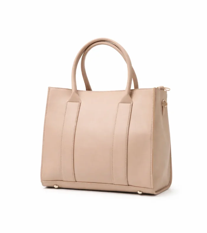 Structured nude beige vegan leather square tote bag with long handles and a minimalist smooth finish.