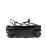 Large tote bag with a black and grey chevron pattern, black leather handles, and a secure top zipper.